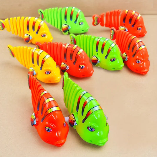 【Numerar la livrare】Plastic Wind-Up Wiggle Fish Toys