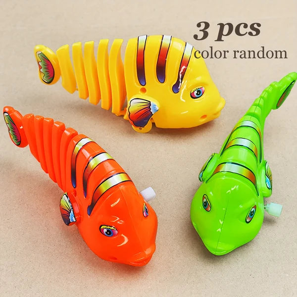 【Numerar la livrare】Plastic Wind-Up Wiggle Fish Toys