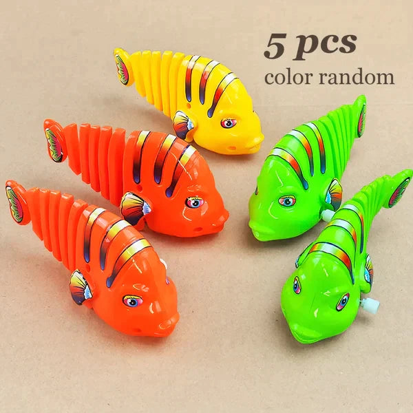 【Numerar la livrare】Plastic Wind-Up Wiggle Fish Toys